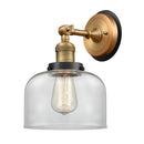 Bell Sconce shown in the Brushed Brass finish with a Clear shade