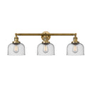 Bell Bath Vanity Light shown in the Brushed Brass finish with a Seedy shade
