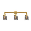 Bell Bath Vanity Light shown in the Satin Gold finish with a Plated Smoke shade