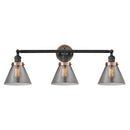 Cone Bath Vanity Light shown in the Matte Black finish with a Plated Smoke shade