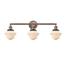 Oxford Bath Vanity Light shown in the Antique Copper finish with a Matte White shade