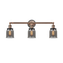 Bell Bath Vanity Light shown in the Antique Copper finish with a Plated Smoke shade