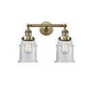 Canton Bath Vanity Light shown in the Antique Brass finish with a Clear shade
