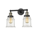 Canton Bath Vanity Light shown in the Black Antique Brass finish with a Clear shade