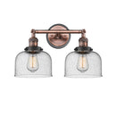 Bell Bath Vanity Light shown in the Antique Copper finish with a Seedy shade