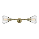 Fulton Bath Vanity Light shown in the Antique Brass finish with a Clear shade