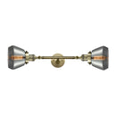 Fulton Bath Vanity Light shown in the Antique Brass finish with a Plated Smoke shade