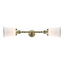 Canton Bath Vanity Light shown in the Antique Brass finish with a Matte White shade