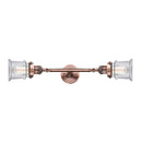 Canton Bath Vanity Light shown in the Antique Copper finish with a Clear shade