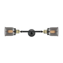 Bell Bath Vanity Light shown in the Black Antique Brass finish with a Plated Smoke shade