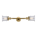 Canton Bath Vanity Light shown in the Brushed Brass finish with a Seedy shade