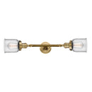 Bell Bath Vanity Light shown in the Brushed Brass finish with a Clear shade