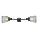 Chatham Bath Vanity Light shown in the Matte Black finish with a Clear shade