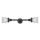 Canton Bath Vanity Light shown in the Matte Black finish with a Seedy shade