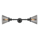 Cone Bath Vanity Light shown in the Matte Black finish with a Plated Smoke shade
