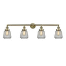 Chatham Bath Vanity Light shown in the Antique Brass finish with a Clear shade