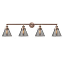 Cone Bath Vanity Light shown in the Antique Copper finish with a Plated Smoke shade