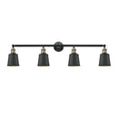 Addison Bath Vanity Light shown in the Black Antique Brass finish with a Matte Black shade