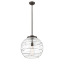 Deco Swirl Pendant shown in the Oil Rubbed Bronze finish with a Clear shade