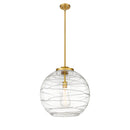 Deco Swirl Pendant shown in the Satin Gold finish with a Clear shade