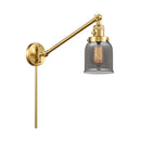 Bell Swing Arm shown in the Satin Gold finish with a Plated Smoke shade