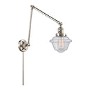 Oxford Swing Arm shown in the Polished Nickel finish with a Seedy shade