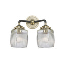 Colton Bath Vanity Light shown in the Black Antique Brass finish with a Clear Halophane shade