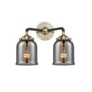 Bell Bath Vanity Light shown in the Black Antique Brass finish with a Plated Smoke shade