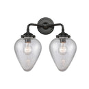 Geneseo Bath Vanity Light shown in the Oil Rubbed Bronze finish with a Clear Crackled shade