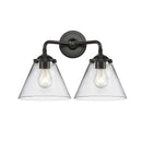 Cone Bath Vanity Light shown in the Oil Rubbed Bronze finish with a Clear shade