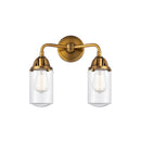Dover Bath Vanity Light shown in the Brushed Brass finish with a Clear shade