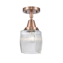 Colton Flush Mount shown in the Antique Copper finish with a Clear Halophane shade