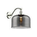 Bell Sconce shown in the Polished Nickel finish with a Plated Smoke shade