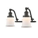 Canton Bath Vanity Light shown in the Oil Rubbed Bronze finish with a Matte White shade