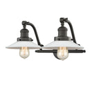 Halophane Bath Vanity Light shown in the Oil Rubbed Bronze finish with a Matte White Halophane shade