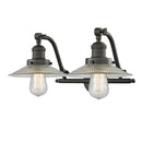 Halophane Bath Vanity Light shown in the Oil Rubbed Bronze finish with a Clear Halophane shade