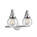 Beacon Bath Vanity Light shown in the Polished Chrome finish with a Seedy shade