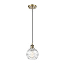 Deco Swirl Mini Pendant shown in the Antique Brass finish with a Clear shade