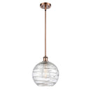 Deco Swirl Mini Pendant shown in the Antique Copper finish with a Clear shade