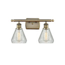 Conesus Bath Vanity Light shown in the Antique Brass finish with a Clear Crackle shade