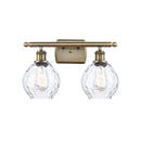 Waverly Bath Vanity Light shown in the Antique Brass finish with a Clear shade