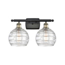 Deco Swirl Bath Vanity Light shown in the Black Antique Brass finish with a Clear shade