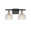 Dayton Bath Vanity Light shown in the Black Antique Brass finish with a Clear shade