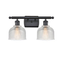 Dayton Bath Vanity Light shown in the Matte Black finish with a Clear shade