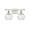 Deco Swirl Bath Vanity Light shown in the White and Polished Chrome finish with a Clear shade
