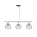 Deco Swirl Island Light shown in the Polished Nickel finish with a Clear shade