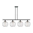 Deco Swirl Island Light shown in the Matte Black finish with a Clear shade