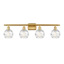 Deco Swirl Bath Vanity Light shown in the Satin Gold finish with a Clear shade