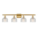 Dayton Bath Vanity Light shown in the Satin Gold finish with a Clear shade
