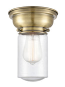 Dover Flush Mount shown in the Antique Brass finish with a Seedy shade